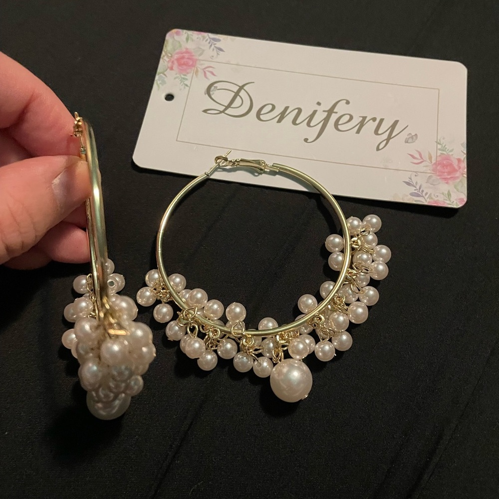 Gold hoop earrings with dangling pearls